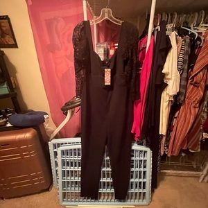 New Boo Hoo Black Jumpsuit size 16 with lace sleeves